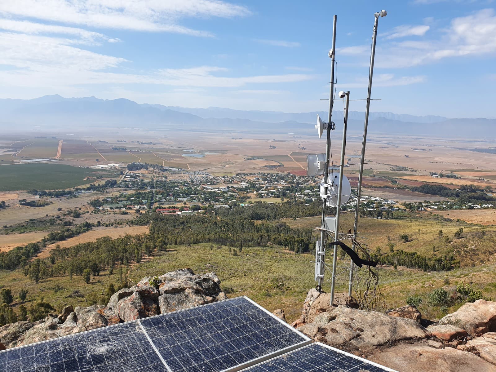 Solar-backed dish installation